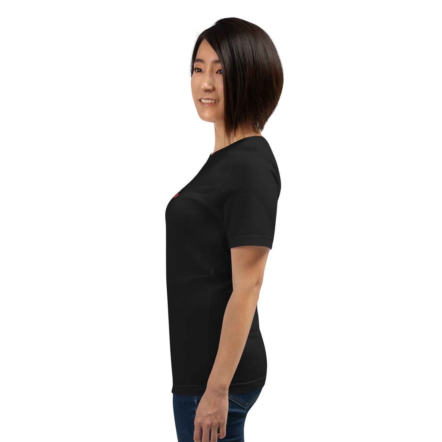 Seitenansicht am Model: Gezeigt wird der satte Farbton Vintage Schwarz und die Passform des POLCOUTURE Unisex-Shirts.